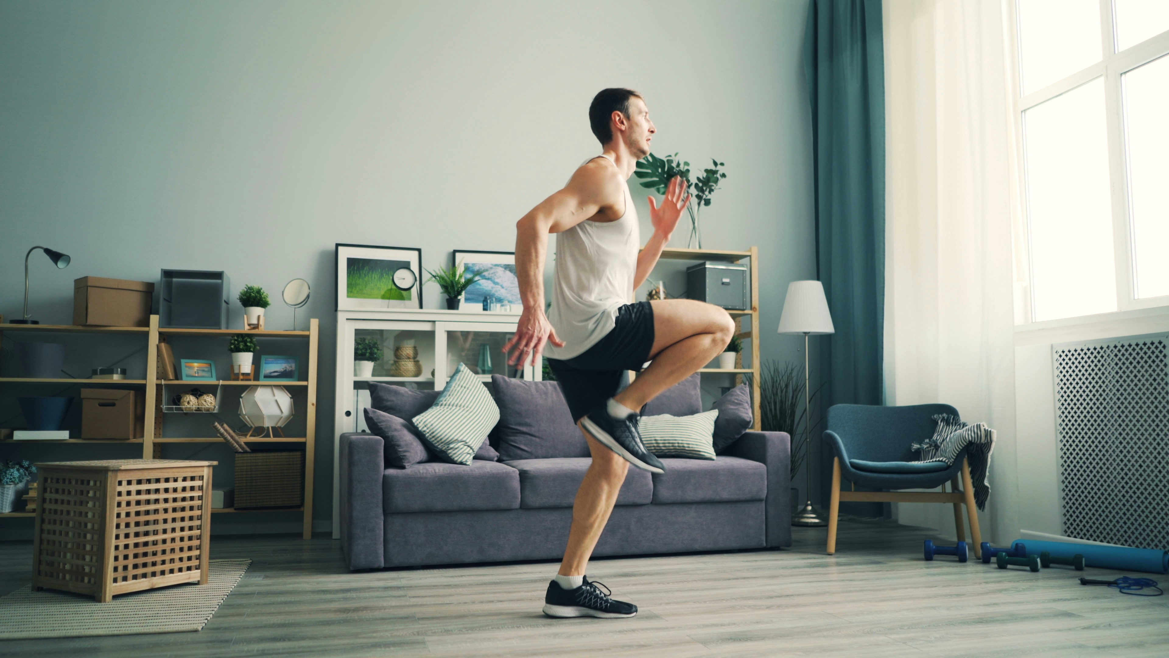 Man working out in a living room